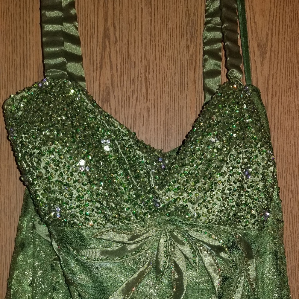 Green beaded evening gown